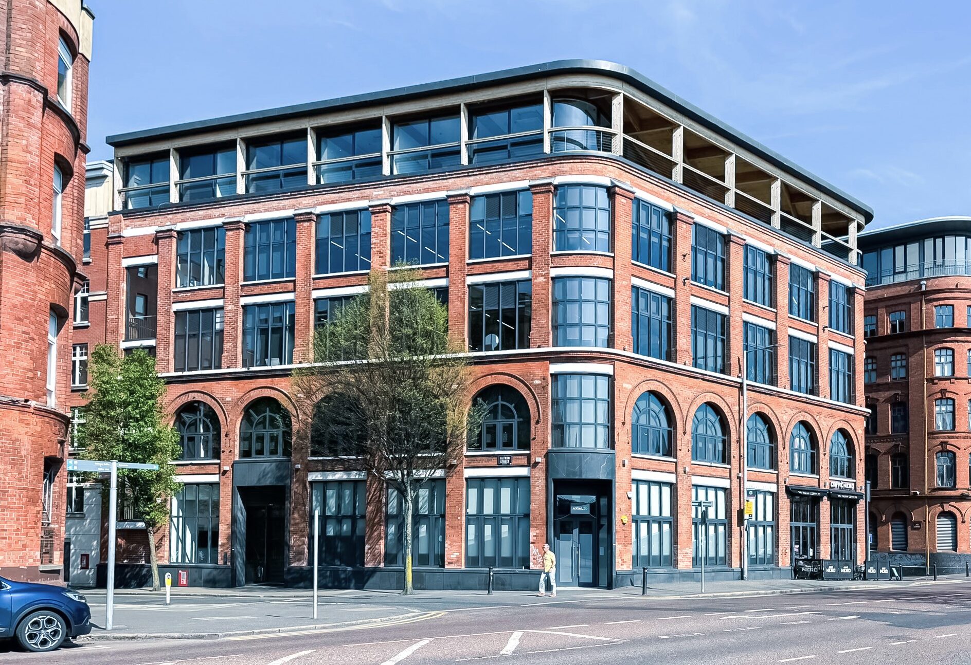 Completed street elevation showing the refreshed façade and its relationship with neighbouring buildings.